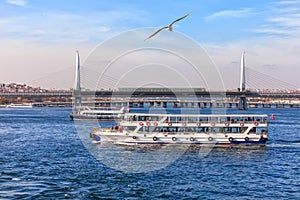 Ferries in the Bosphorus and the Halic Metro Bridge, Istanbul photo