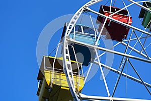 Ferris wheel against blue skay