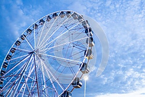 Ferris Wheel against a blue sky