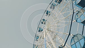 Ferris wheel against blue sky