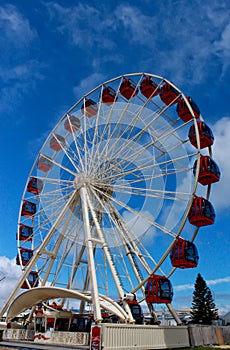 Ferris wheel against blue sky