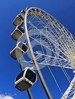 Ferris Wheel Against a Clear Blue Sky
