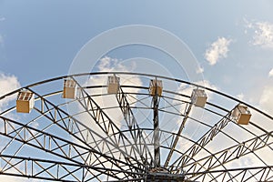 Ferris wheel. Amusement park. Ferris wheel cabins