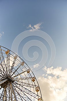 Ferris wheel. Amusement park. Ferris wheel cabins