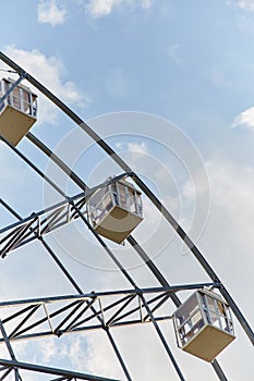 Ferris wheel. Amusement park. Ferris wheel cabins