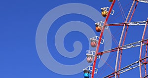A ferris wheel at the amusement park in Odaiba Tokyo daytime long shot