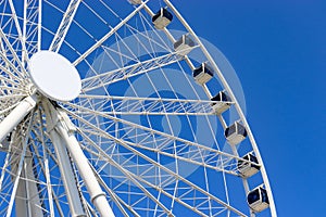 Ferris wheel on a blue sky