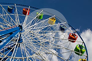 Ferris wheel on blue sky