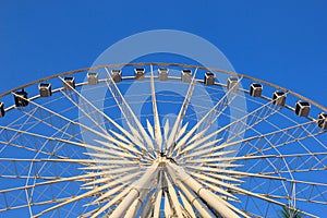 Ferris wheel with blue sky