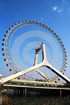 Ferris wheel with blue sky
