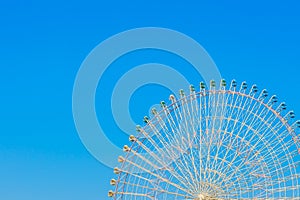 Ferris Wheel with Blue Sky.