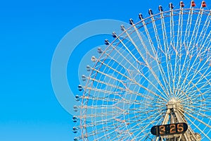 Ferris Wheel with Blue Sky.