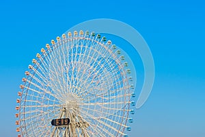 .Ferris Wheel with Blue Sky