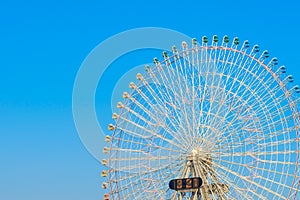 .Ferris Wheel with Blue Sky