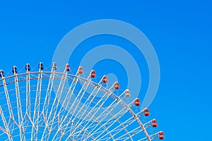 .Ferris Wheel with Blue Sky