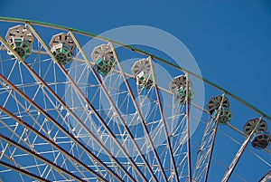 Ferris wheel in blue sky