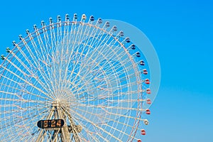 .Ferris Wheel with Blue Sky