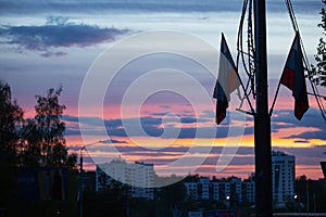 Ferris wheel in the city park at sunset