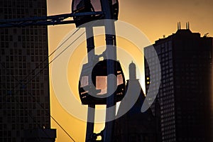 Ferris wheel with city skyline against sunset at Navy Pier,Chicago