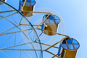 Ferris wheel close-up in summer at the amusement Park