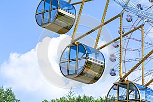 Ferris wheel close-up in summer at the amusement Park