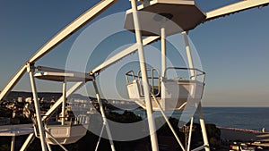 Ferris wheel close up at sunset