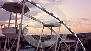 Ferris wheel close up at sunset