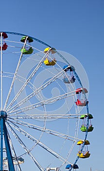 Ferris wheel with colored booths