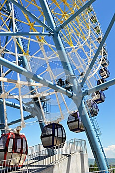 Ferris wheel with colorful cabins