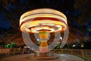 Ferris Wheel at county fair at night, motion blurred