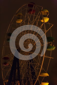 Ferris wheel in the dark sky, night