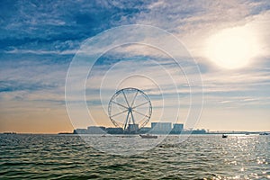 Ferris wheel in Dubai, United Arab Emirates, from blue sea