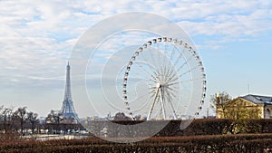 The ferris wheel and the Eiffel Tower in Paris