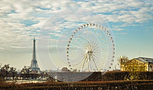 The ferris wheel and the Eiffel Tower in Paris