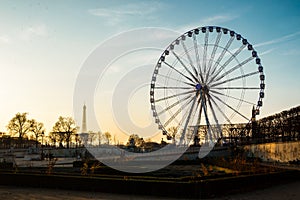 The ferris wheel and the Eiffel Tower in Paris