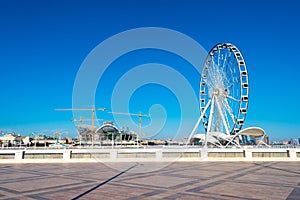 Ferris wheel on the embankment