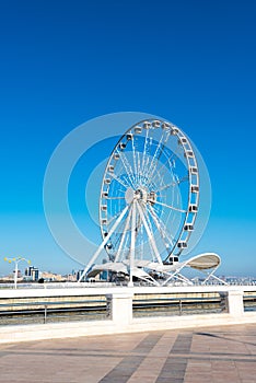 Ferris wheel on the embankment