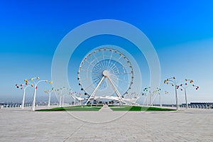 Ferris wheel on the embankment