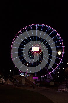 Ferris wheel illuminated at night photo