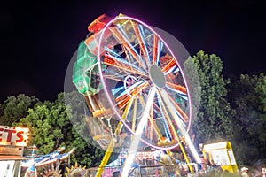 Ferris wheel lights at state fair at  night