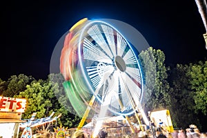 Ferris wheel lights at state fair at night