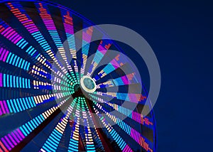 Ferris Wheel motion on a night sky