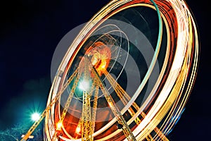 Ferris wheel in motion tracer with backlight  copy space