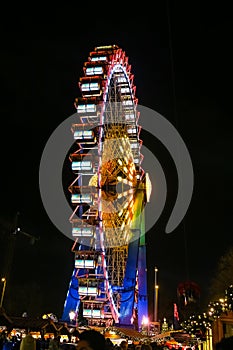 Ferris Wheel in Neptunbrunnen Christmas Market in Berlin, German