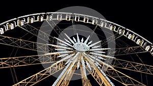 Ferris wheel at night. Close-up.