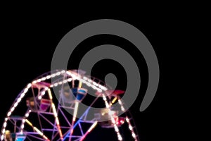 Ferris wheel in a night park.