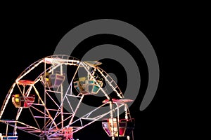 Ferris wheel in a night park.