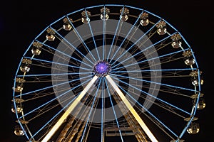 Ferris wheel at night at the small fair