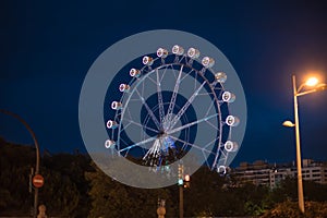 Ferris wheel at night in Valencia Spain