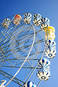 Ferris Wheel Over Blue Sky